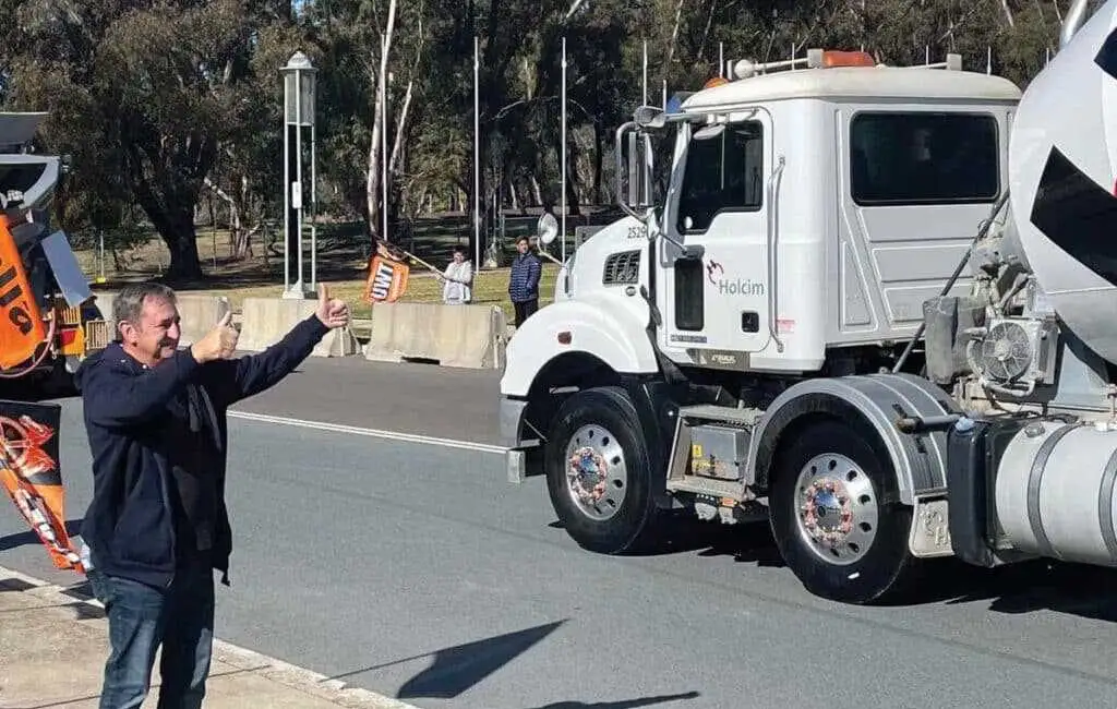 Truck drivers protesting road transport remuneration laws in a convoy