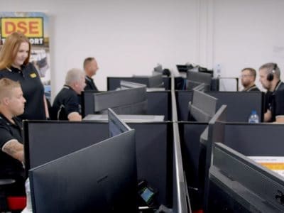 DSE Transport operations staff planning freight jobs at their desks in the Sydney office